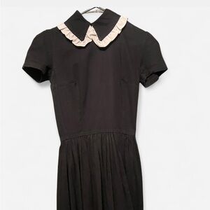 Deandri elegant black dress with white trim collar